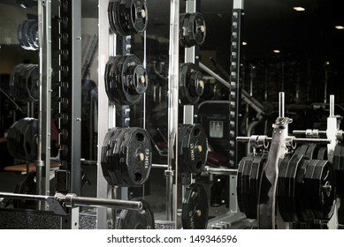 Weight lifting equipments in a club gym.