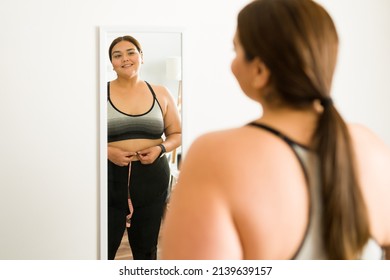 Weight Loss Concept. Excited Obese Woman Feeling Proud Of Herself For Losing Some Weight With Diet And Exercise