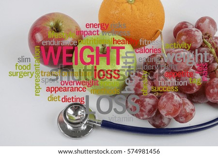 Weight Loss conceptual cloud text with fruits background.