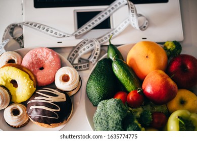 Weight Loss Program, Diet, Active Lifestyle, Online Dietician, Healthy Living. Laptop, Measure Tape, Vegetables And Sweets. Balanced Nutrition Concept