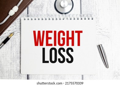 Weight Loss Words On Notepad And Stethoscope