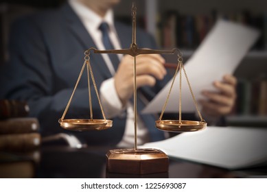 Weight scale of justice. Lawyer, attorney, working in office. Consultant lawyer with paperwork
