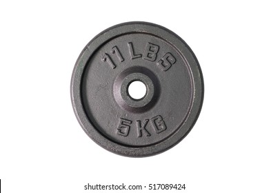 Weight for sport isolated on white background. Gym equipment 5 kilograms (kg.), Black metal barbell tool plate for exercise and fitness. Dumbbell heavy concept with cut out.