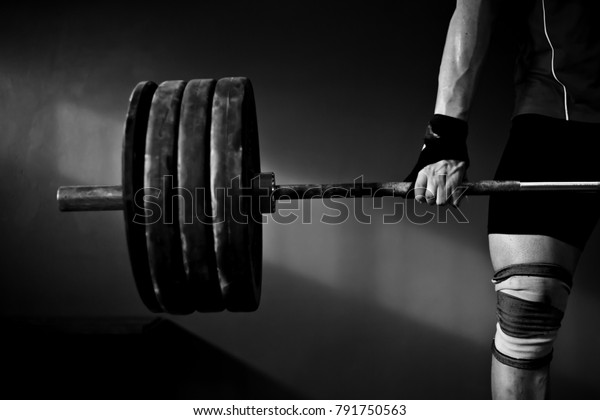 weightlifter in a old\
gym