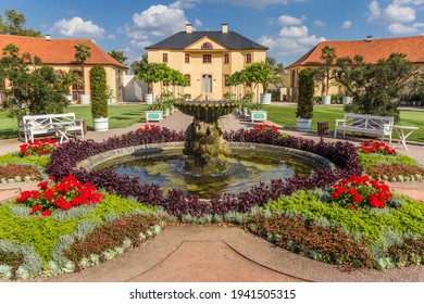 WEIMAR, GERMANY - SEPTEMBER 22, 2020: Colorful garden and fountain at the Belvedere castle in Weimar, Germany