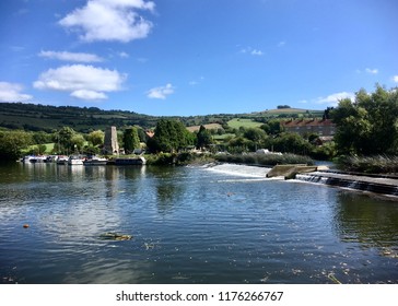 Weir On The River Avon Near Saltford Between Bath And Bristol In The UK On A Summers Day