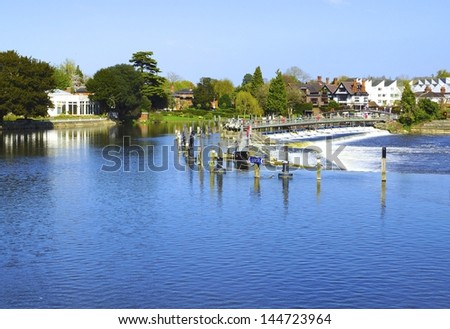 A weir on the river Thames at Henley in England UK