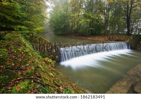 
Weir on the river at the turnoff of the mill drive. River Juhyne. East Moravia. Czech Republic. Europe.