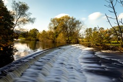 Weir On The River Wharfe At Burley In Wharfedale