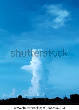 a weird cloud that look like Godzilla or something.