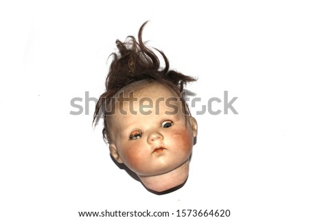 Weird Freaky Toy Doll Parts on White Background