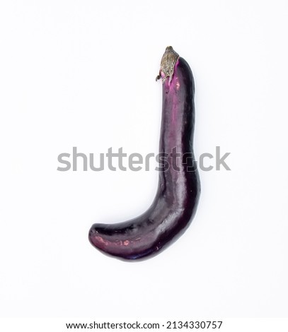 Weird looking egg plant vegetable from above. Looks like a body part.