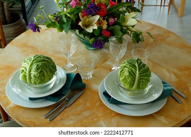 Weird Table Setting. Only Cabbage Is Served