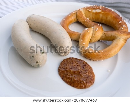 Weisswurst Bavarian or German White Sausage Pair with Pretzel and Sweet Mustard