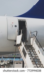 Welcome Aboard. The Open Door In The Plane.