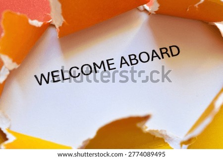 welcome aboard write on orange - yellow background 