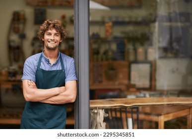 Welcome, arms crossed and portrait of man at restaurant for small business, coffee shop and waiter. Entrepreneur, happy and smile with male barista at front door of cafe for diner and food industry
