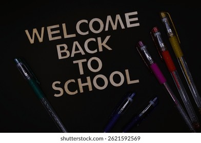 welcome back to school write between school supplies