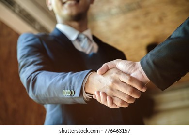 Welcome To Board! Asian Business People Shaking Hands With New Partner Meeting Time After Agree Join New Start Up Project, Business Co-working Teamwork Concept