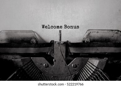 Welcome Bonus typed words on a vintage typewriter