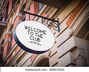 Welcome To The Club Signage Hanging Banner. Business Owner Puts An Open Sign.