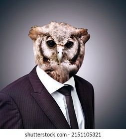 Welcome To The Corporate Jungle. Conceptual Image Of Animal Heads On Business People.