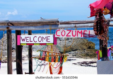 Welcome To Cozumel Sign On A Beach