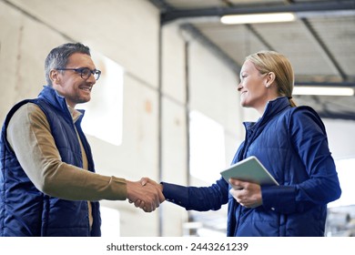 Welcome, deal and business people with handshake for partnership, distribution or agreement. Professional, technology and shaking hands for export support, b2b networking or onboarding in warehouse - Powered by Shutterstock