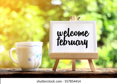 Welcome February. concept of coffee cup with stand board on morning background - Powered by Shutterstock