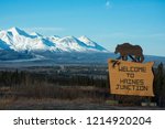 Welcome to Haines Junction Sign with the Kluane Mountaines and the community of Haines Junction in the Background