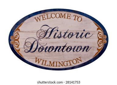 A Welcome to Historic Downtown Wilmington sign isolated on white