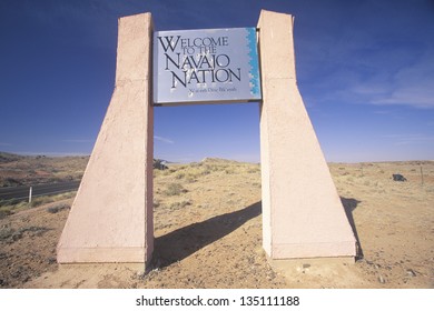 Welcome To The Navajo Nation Sign Next To A Road