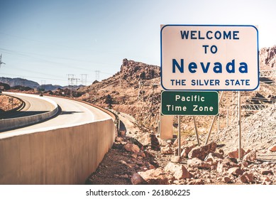 Welcome To Nevada. The Silver State. Highway Welcome Sign. Pacific Time Zone.