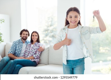 Welcome To New Life! Portrait Of Nice Cute Lovely Attractive Cheerful Cheery People Girl Showing Keys Thumbup Realestate Room Advert Ad Advice In Modern White Light Interior Room Indoors