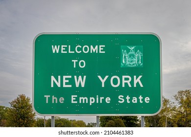 A Welcome To New York State Line Highway Sign Marking The Border With The Commonwealth Of Pennsylvania.