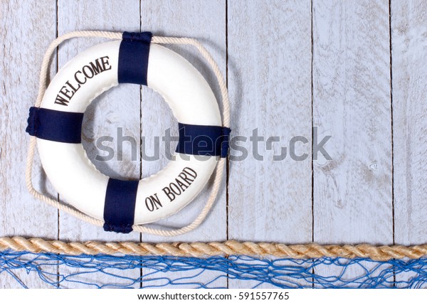 Welcome on Board\
- lifebuoy with text on vertical wooden background texture, copy\
space for individual\
text