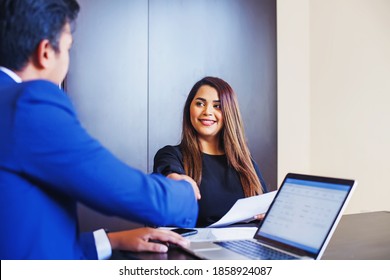 Welcome Onboard Concept. Indian Man And Woman Shake Hands In Office