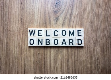 Welcome Onboard Text From Wooden Blocks. Onboarding, Employment, New Hire Concept