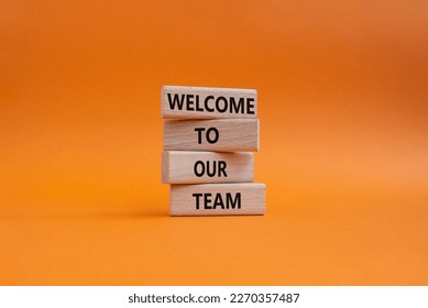Welcome to our team symbol. Concept words Welcome to our team on wooden blocks. Beautiful orange background. Business and Welcome to our team concept. Copy space. - Shutterstock ID 2270357487