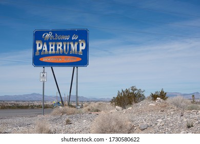 Welcome To Pahrump Sign On Two Lane Highway In Nevada