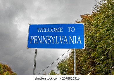 A Welcome to Pennsylvania state line highway sign marking the border with the State of Ohio.