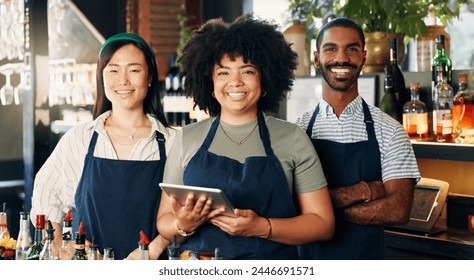 Welcome, restaurant and portrait of team at bar with manager, waiter and waitress at startup with digital app. Bistro, service barman and diversity, happy small business owner at cafe with tablet. - Powered by Shutterstock