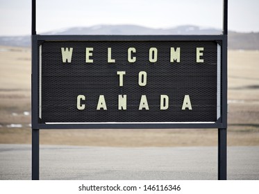 A Welcome Sign At The Canadian Border In Alberta.