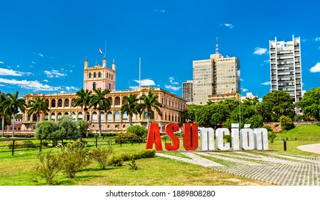 The welcome sign and Palace of the Lopez in Asuncion, Paraguay