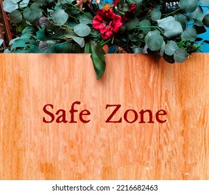 Welcome Wood Sign With Text Written SAFE ZONE, Means Places Where People Can Feel Safe - Free Of Bias, Conflict, Criticism Or Discrimination, No Emotional Or Physical Harm