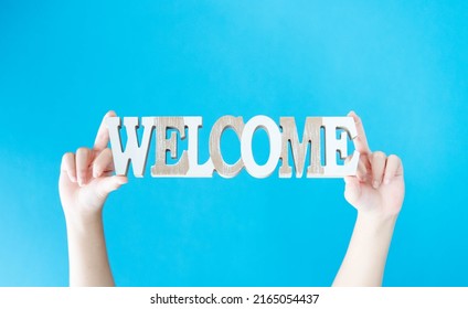 Welcome Word With Kid Hand Concept Idea Design For Poster Invitation Decoration Home.School Kid Holding Welcome Back To School Party.Entrance Welcome Speech Onboarding Office Team.kid Child Invite.