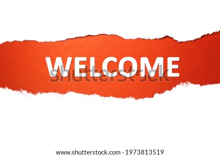 welcome is written on a red background which is located in the center of a white torn sheet in the form of a horizontal line