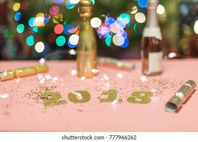 Welcoming 2018 with party poppers and champagne - Happy New Year!