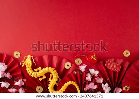 Welcoming the auspicious Year of the Dragon for Chinese New Year 2024. Top view photo of gold dragon, folding fans, traditional coins, sakura, lanterns on red background with promo zone