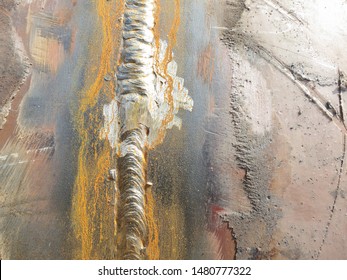 Weld on metal construction. Flash rust on fresh weld joint